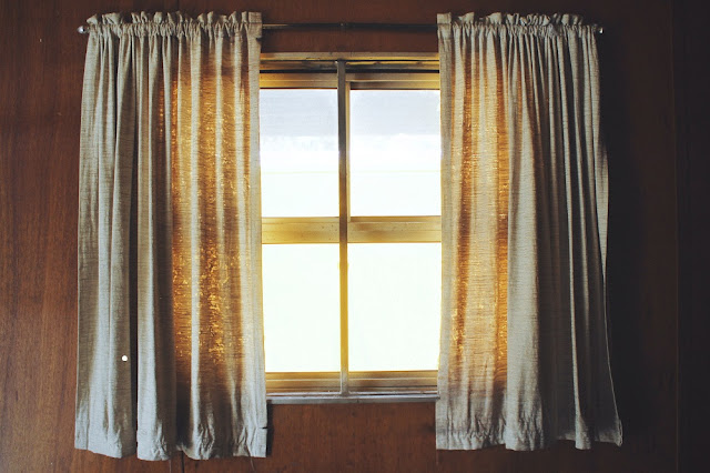 A window with the curtains open