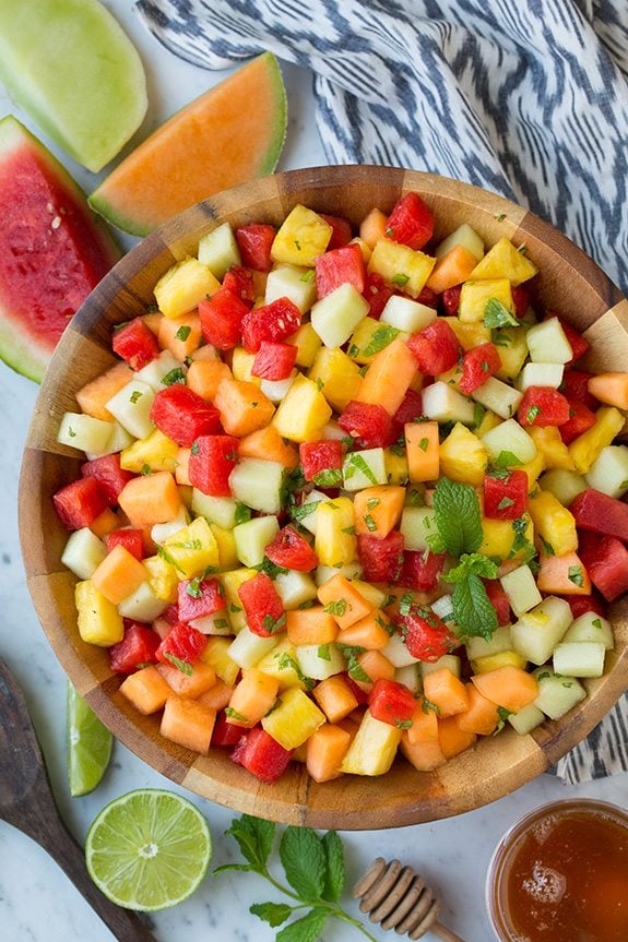 MELON & PINEAPPLE FRUIT SALAD WITH HONEY, LIME AND MINT DRESSING