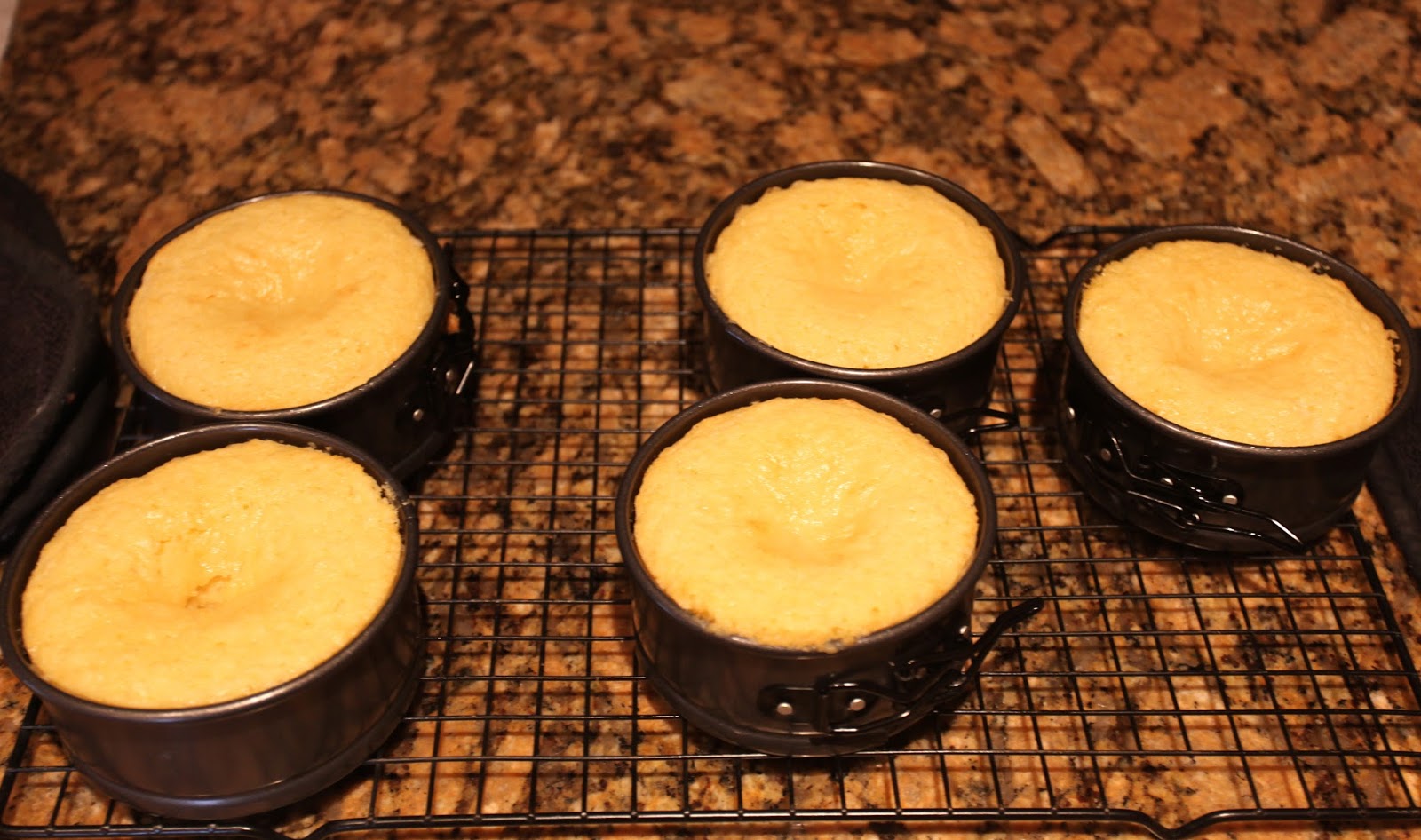 Mini Vanilla Bean Cakes with Lemon Curd And Raspberry Filling