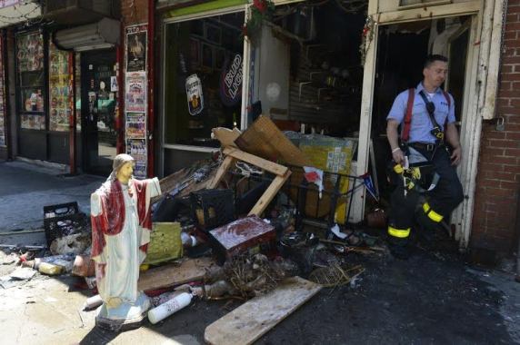 Photos: 'Jesus' Statue Doesn't Get Burn As Firefighters Retrieve Debris From Burning New York Religious Shop