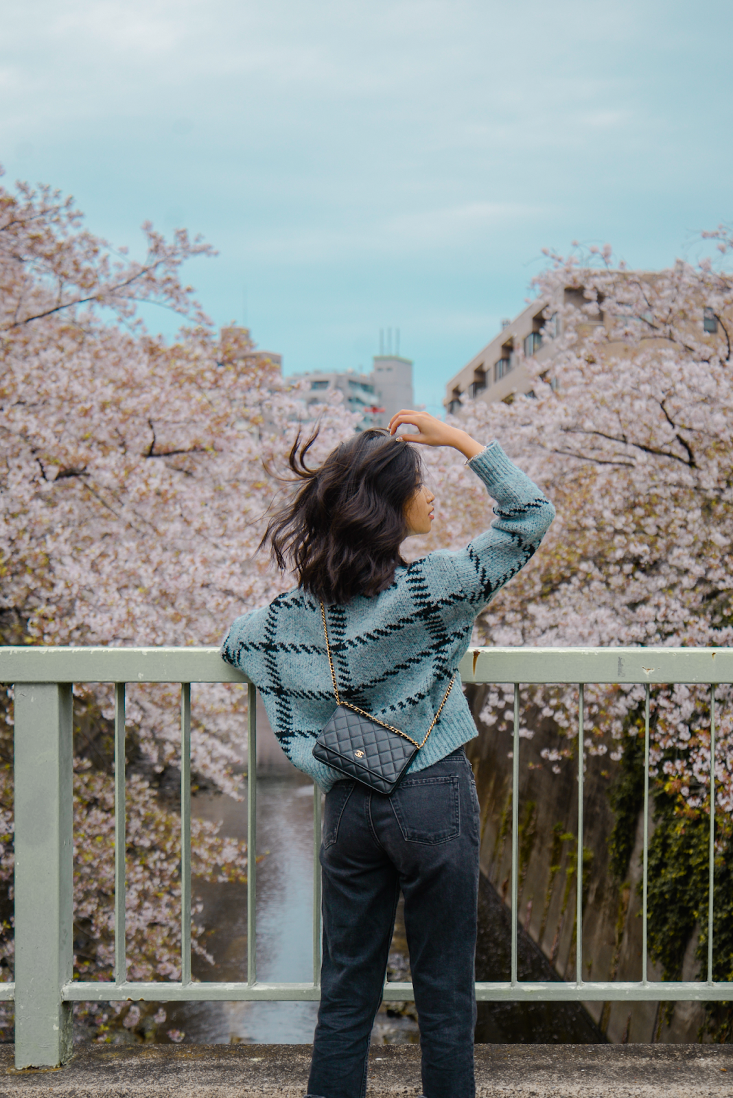 Cherry blossom photo ideas, Cherry blossom views in Tokyo, simple blue sweater outfit, Spring outfit ideas, Tokyo style blogger, Cherry Blossom Season in Tokyo Japan. Personal style blog by Van Le / FOREVERVANNY.com