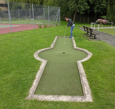 Emily playing the Wellholme Park Crazy Golf course in Brighouse