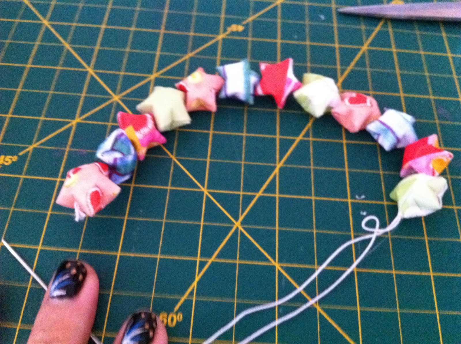 Randomly Taylor'd Paper Star Bracelet Tutorial