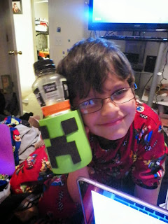 Minecraft Creeper Coolie Cup. Property of Cassie's Creative Crafts