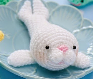 http://www.letsknit.co.uk/free-knitting-patterns/LK71-amigurumi-seal-and-mouse