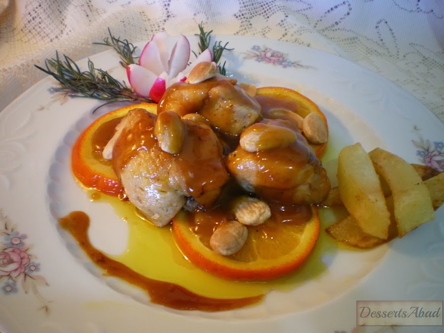 Pollo salteado con almendras y naranjas 