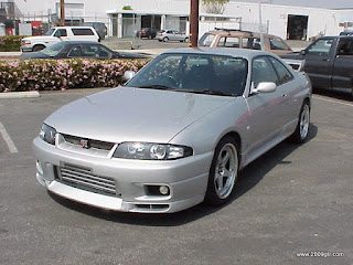 R33 with Xenon headlights and Nismo wheels at MotoRex