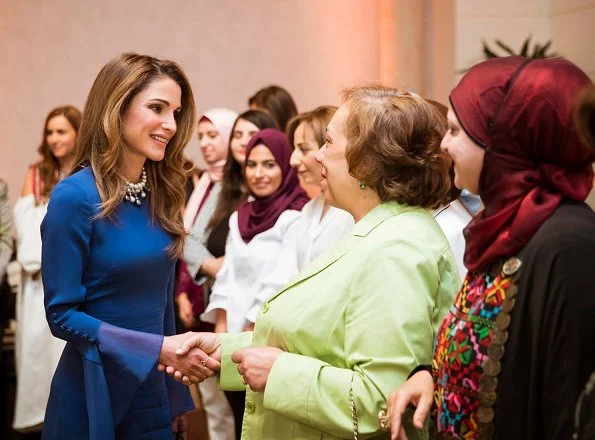 Queen Rania wore Prabal Gurung Bell Sleeve Silk Midi Dress with Asymmetric Skirt. She wore Fendi bag and shoes,wore a pearl necklace.