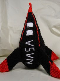 http://www.ravelry.com/patterns/library/rockin-rocket-ship-amigurumi