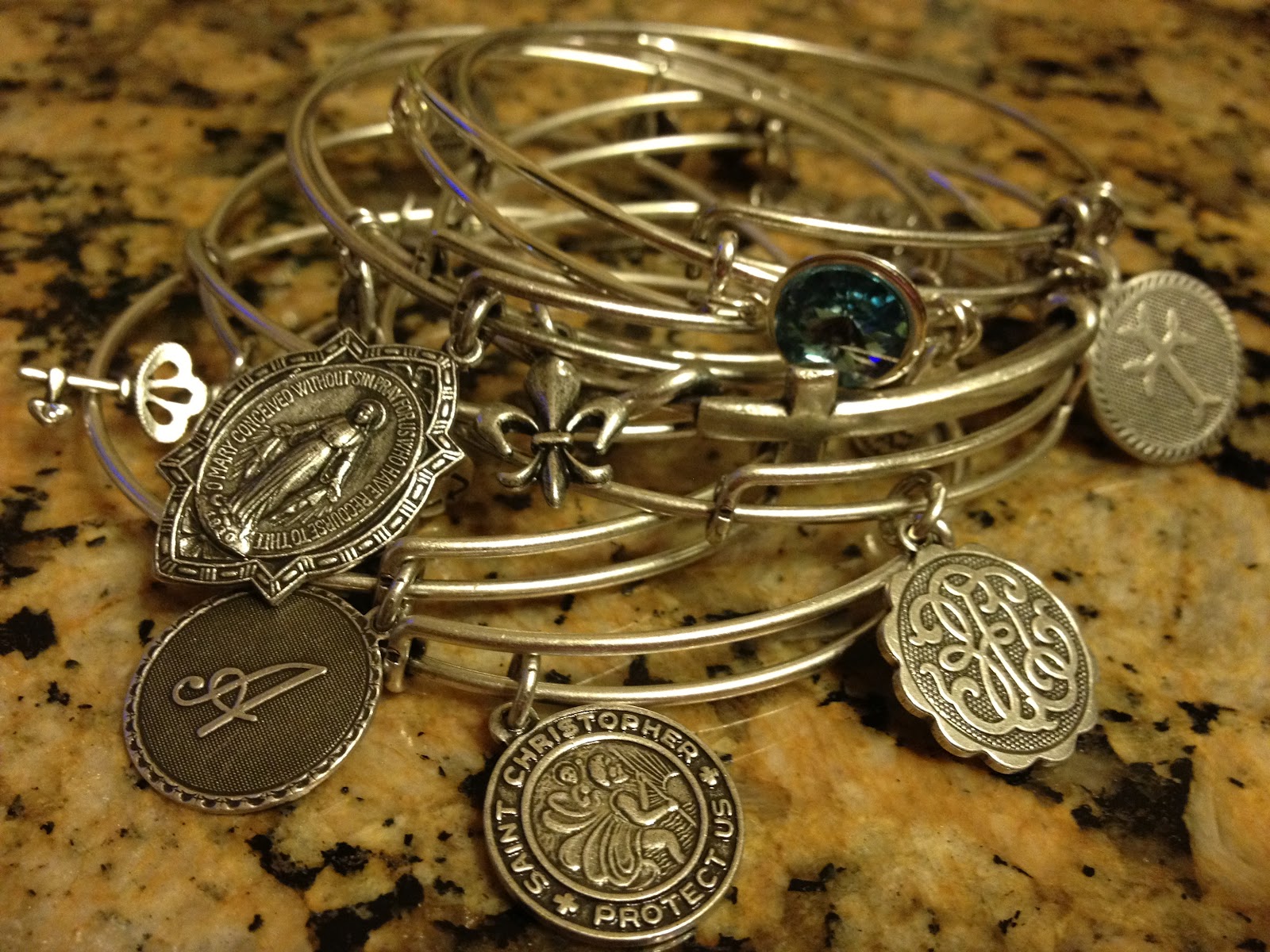 MiSSGLAMOURGiiRL Golden Alex and Ani Bracelets!