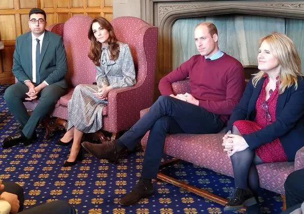 Kate Middleton wore a green Alexander McQueen coat, a print dress by Zara, Zeen ceramic earrings and Aspinal of London Mayfair bag