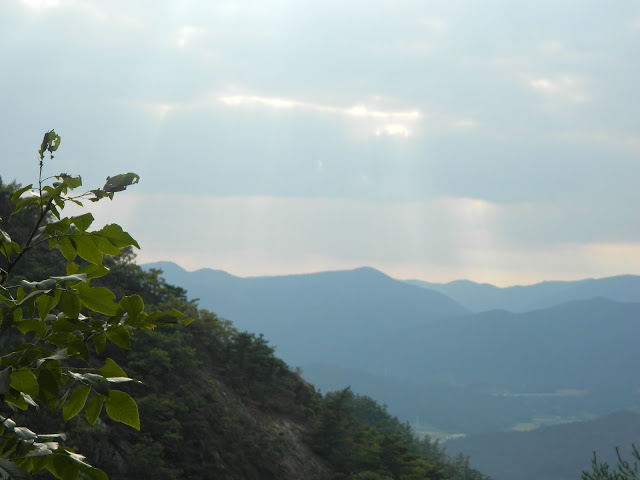 Rays breaking through the clouds, as seen from top of mount Namsan, Gyeongju, Korea