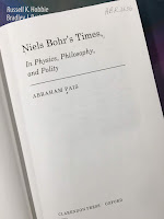 Niels Bohr’s Times: In Physics, Philosophy, and Polity, by Abraham Pais, superimposed on Intermediate Physics for Medicine and Biology.