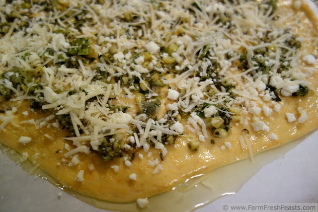 http://www.farmfreshfeasts.com/2013/07/zucchini-corn-and-leek-pizza-with-pesto.html