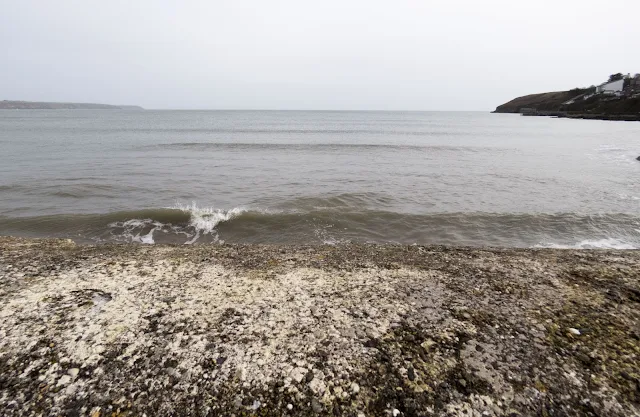 Wave crashing near Ardmore in County Waterford, a good stopping point on the road trip between Dublin and Kinsale