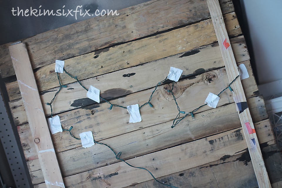 I inserted the sting of lights and held it in place with a little duct