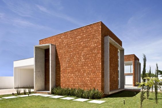 Diseños de casas modernas en ladrillo | licencias de construccion