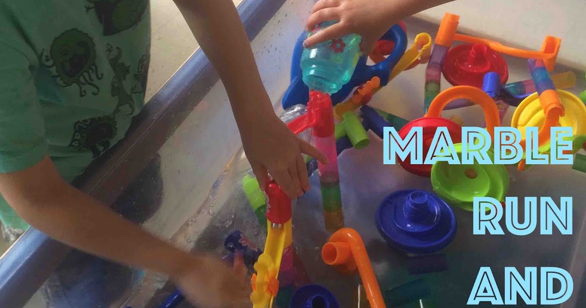 marble run + water = fun rubber boots and elf shoes