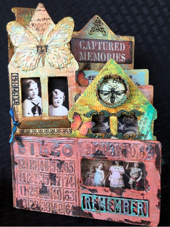 Altered mixed media children's book using DecoArt products.