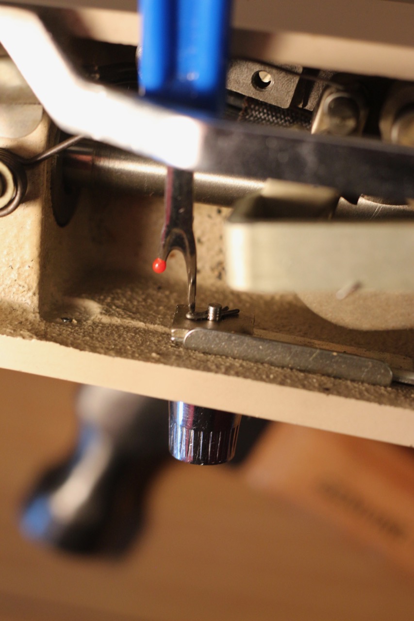 Needle hitting bobbin holder? : r/sewing