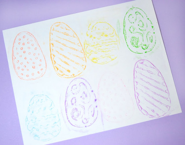 DIY crayon rubbing plates with spring or Easter designs. Make Easter eggs, flowers, bunnies, or chicks with this fun fine motor activity for preschoolers, kindergartners, or elementary children.