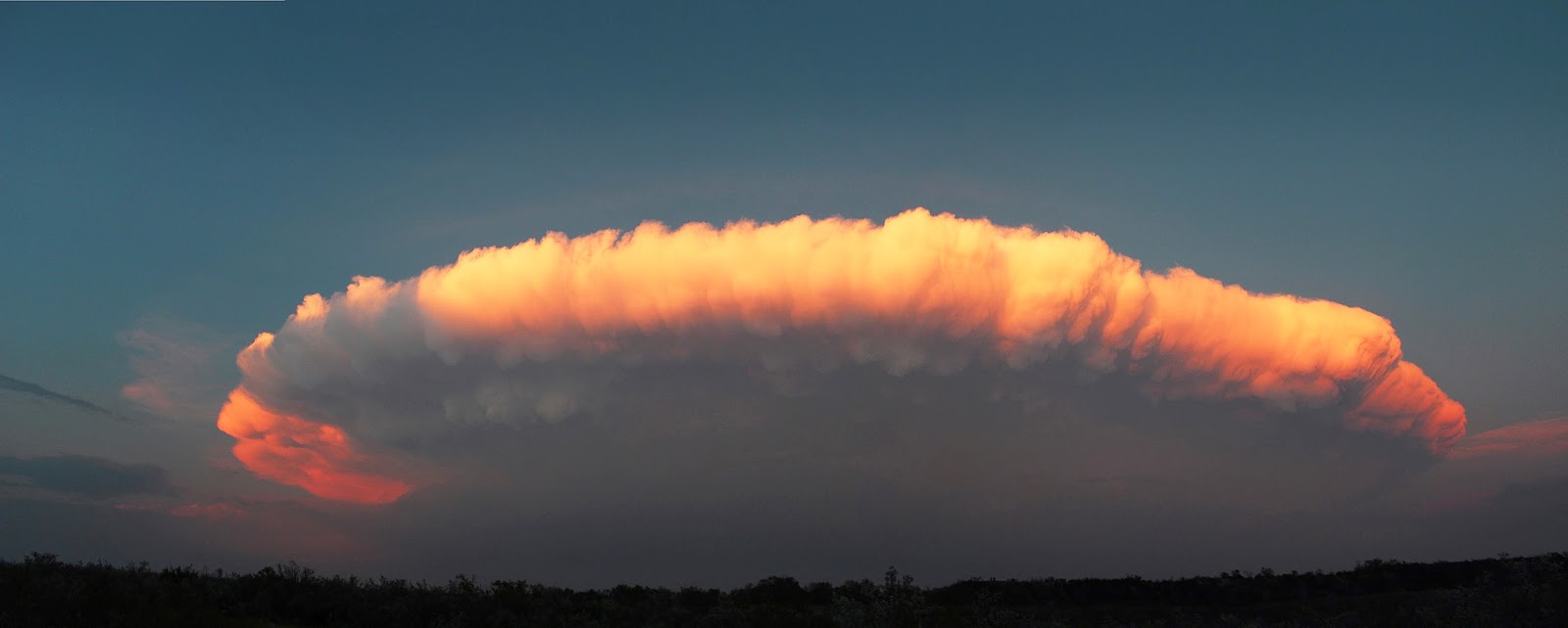 Cumulonimbus Cloud over Texas Cumulonimbus Cloud over Texas   A little later, as the sunset, the storm looks quite different. This kind of complete view of a thunderstorm cloud is typical of the US Great Plains.  Texas, United States May, 2012  Image Credit & Copyright: Kay Cunninghan