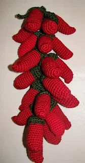 http://www.ravelry.com/patterns/library/crocheted-chili-pepper-ristra