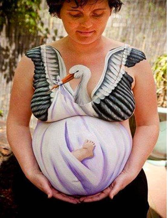 Moms have fun with their baby bump