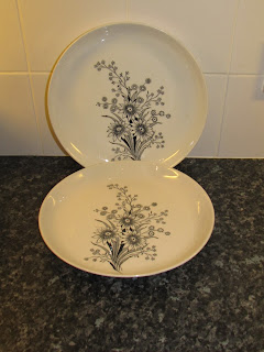 Vintage 1960's Arabia of Finland dinner plates with black and white floral design.