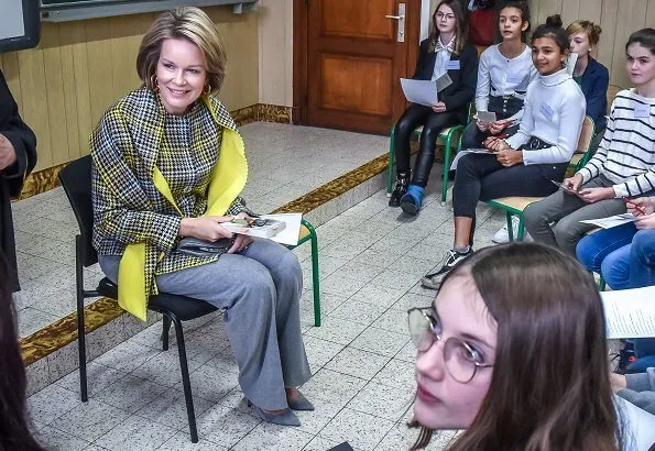 Queen Mathilde wore a new plaid multicolor coat by Natan. Natan coat from Fall/Winter 2019 collection