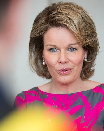 Queen Mathilde met with women from different sectors of Hainaut because of International Day of Women. Queen wore Dries Van Noten Coat and Dress