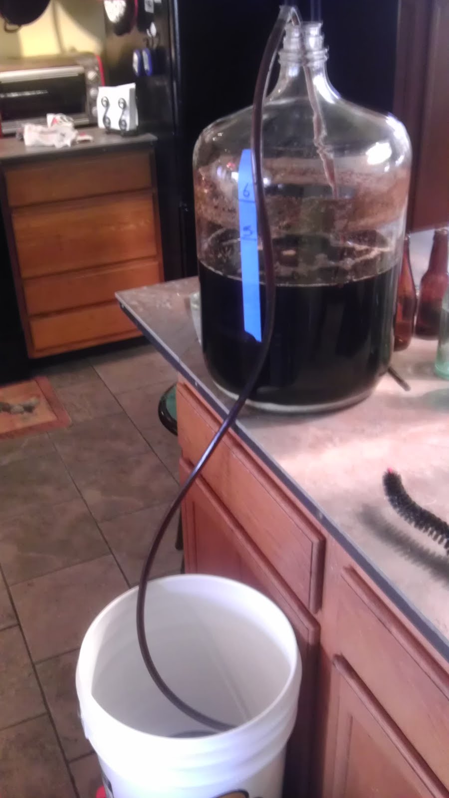 Iron Heart Brewing Milk stout. Step 12 transfer to bottling bucket.