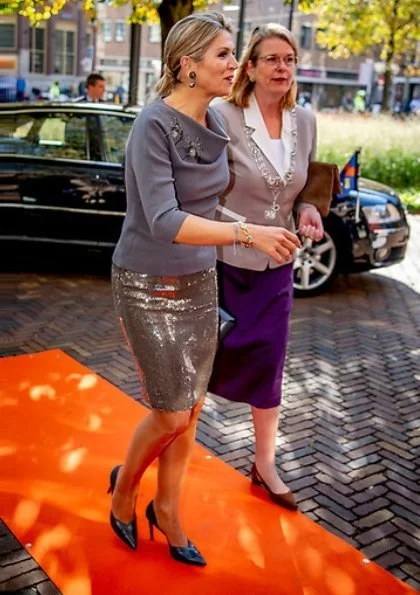 Queen Maxima gave an opening speech at the MKB Nederland congress in The Hague. Queen Maxima wore Sequin midi skirt and grey wool top