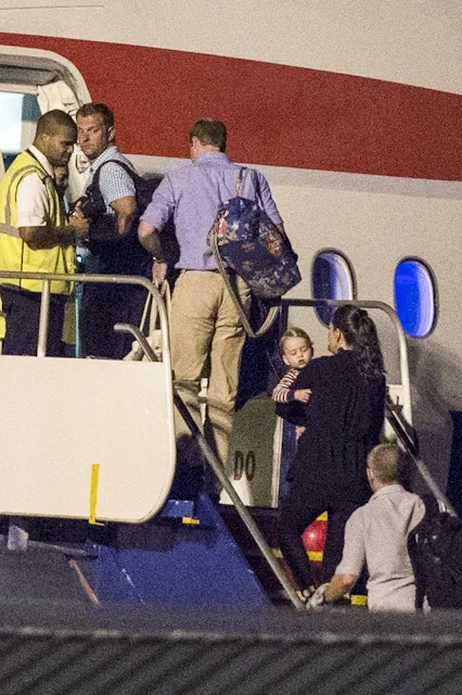 The Duke and Duchess of Cambridge, Prince George fly back to the UK
