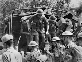 Australian troops after a tough battle on the Malay Peninsula, 14 January 1942 worldwartwo.filminspector.com