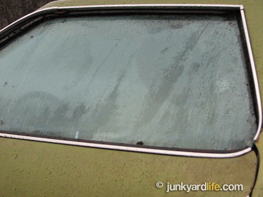 Visibility was limited during the rainy drive in the 1973 Pontiac.