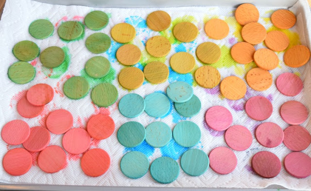 Dyed colored wooden discs for learning or playing Dyed colored wooden discs for learning or playing