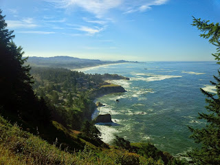 The view from the top of a hill, looking down to the sea