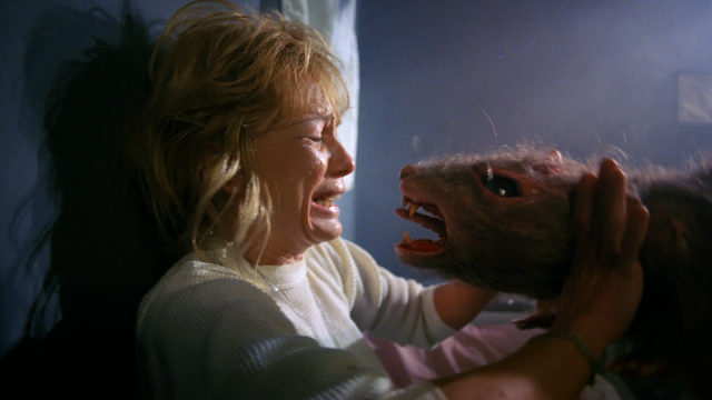a giant rat just wants to be friends with Linnea Quigley