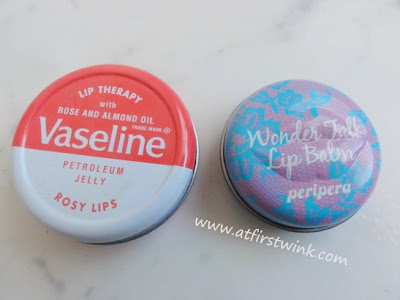 the Peripera Wonder Talk Lip balm tin compared in size with the Vaseline Petroleum Jelly - Rosy lips