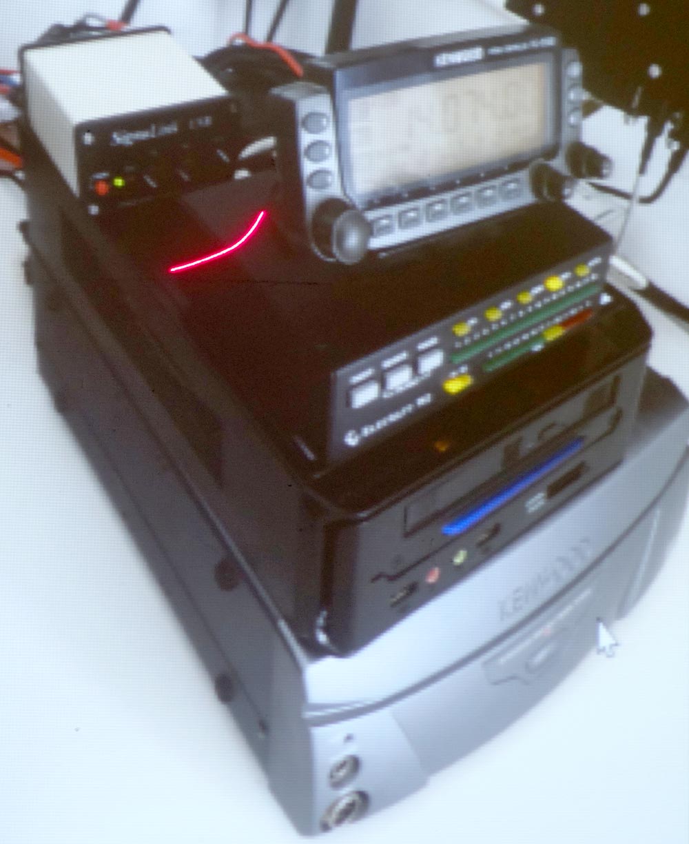 The TS-2000 rig at the bottom, control PC, SWR monitor, Signallink sound card and detachable fascia.