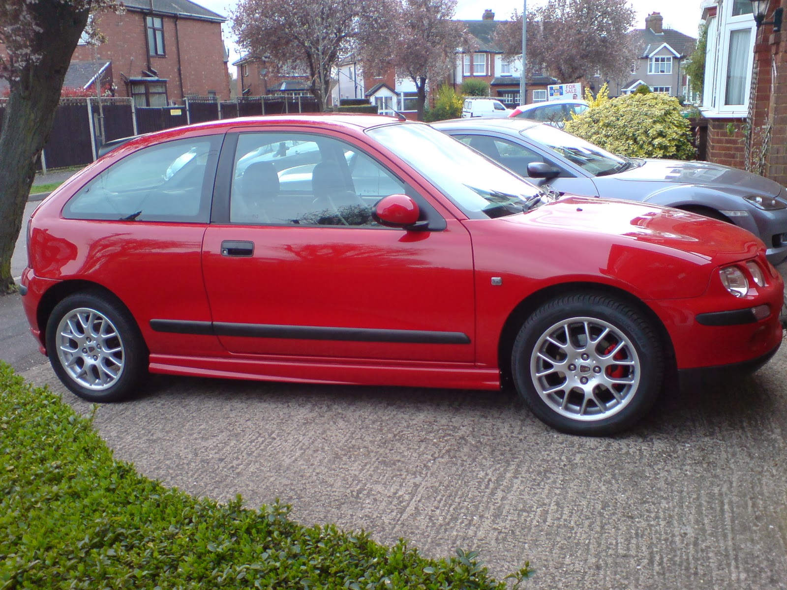 MG ZR Rover 25 with side skirts 16" hairpins solar red