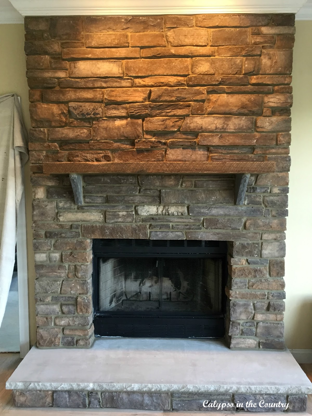 Rustic Stone fireplace after