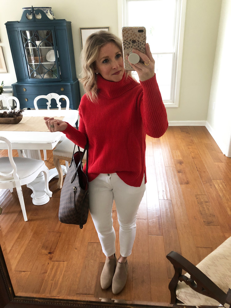 red turtleneck sweater with white skinny jeans and booties