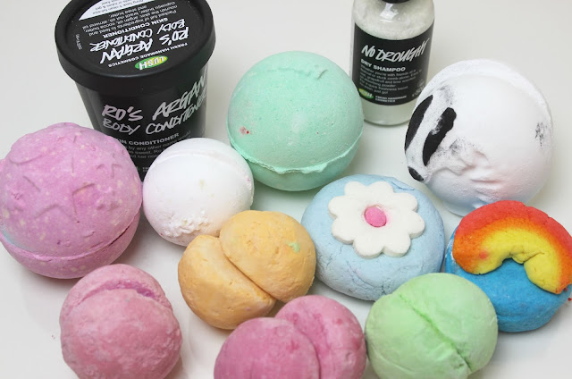 A picture of Lush products including Lush Bath Bombs, Lush Bubble Bars, Lush Dry Shampoo and Lush Body Conditioners