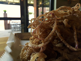 Onion Straws go great on or with your burger!