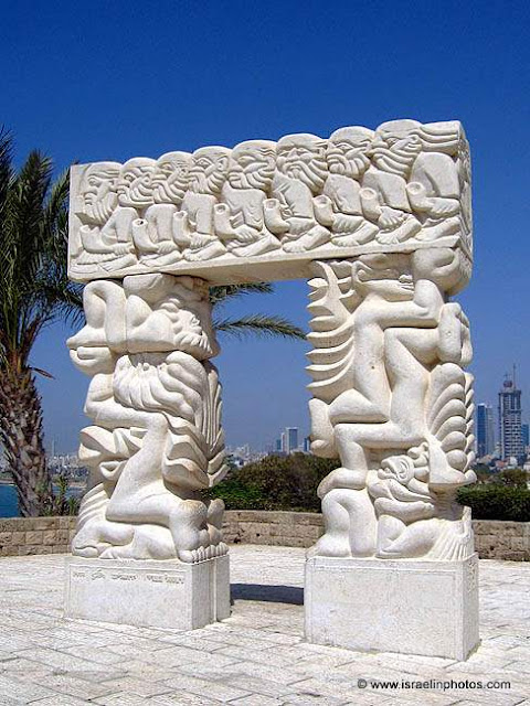 A gate with lessons from the bible carved into the surface