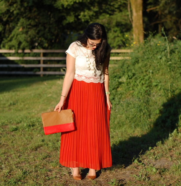 Eyelash lace crop top, pleated red maxi skirt, Ily Couture statement necklace, Aldo Heliette heels and a Gap clutch.