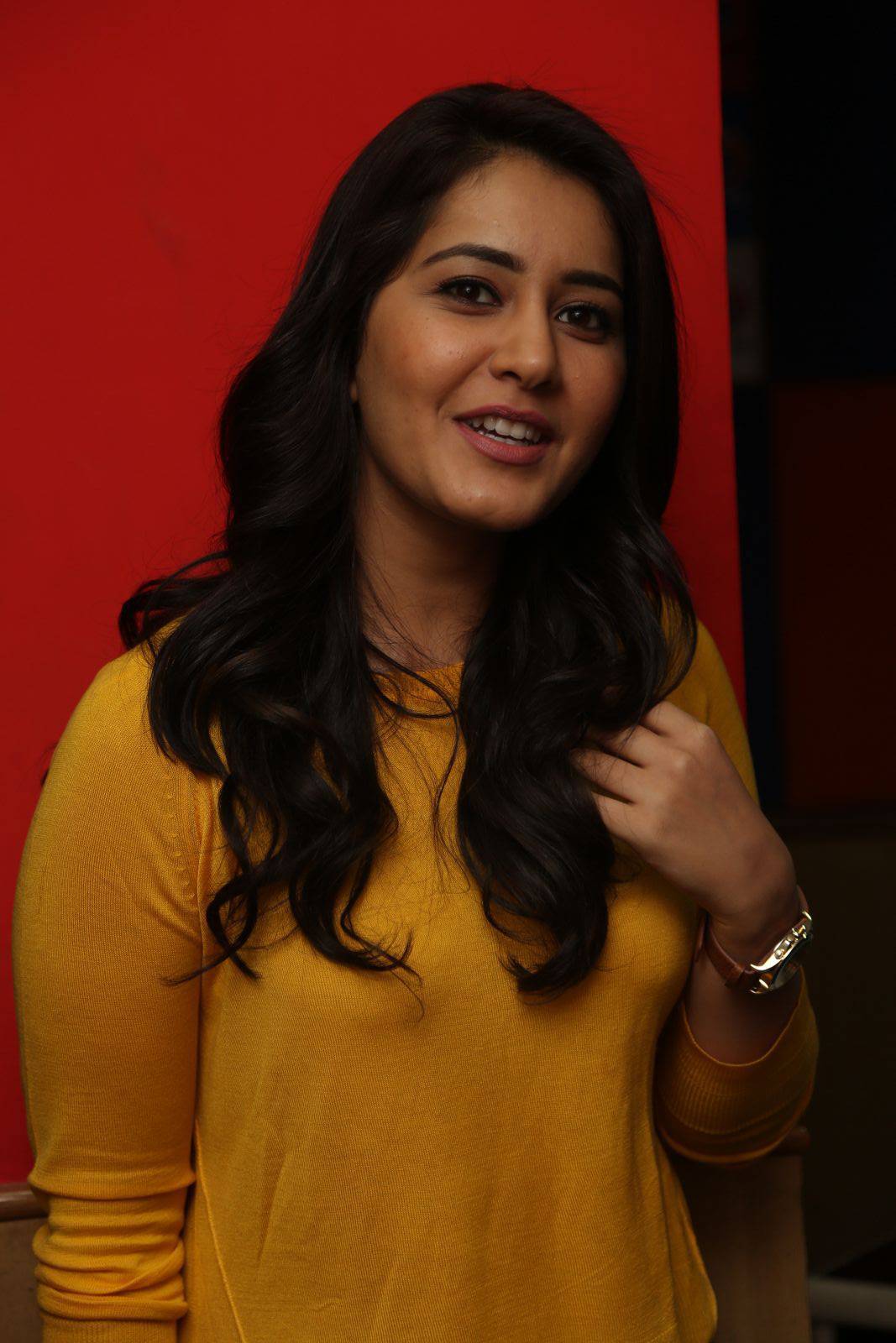 Rashi Khanna Stills In Yellow Dress At Bengal Tiger Movie App Launch