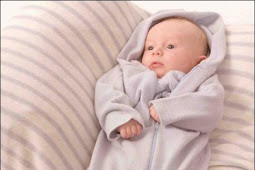 الطفل الصغير في اللفة